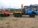 Лесовозный автопоезд Урал 2019 с манипулятором и прицепом / Миасс